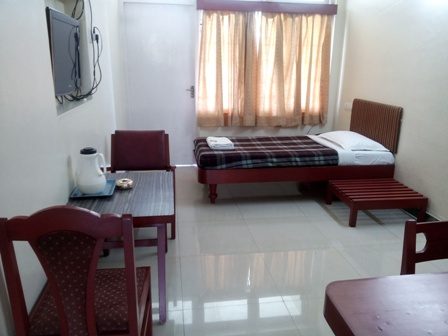 Single AC room at New Woodlands Hotel